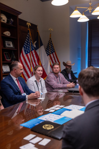 5 people sitting at a table discussing energy in washington d.c